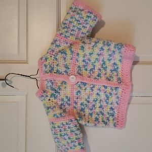 Handmade baby sweater with matching hat